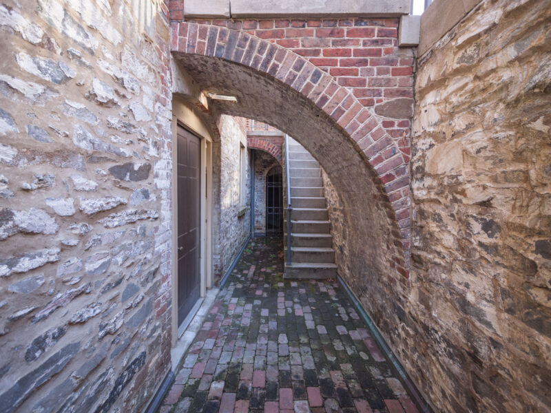 The service entry to the house with a view of the coal vault.